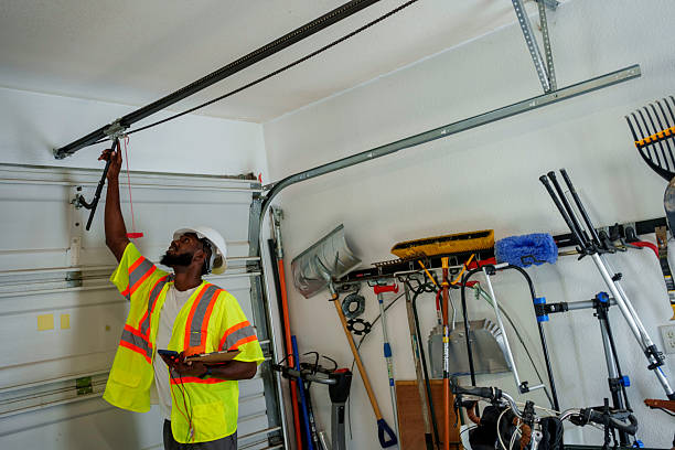 Professional Garage Door Panel Replacement technician working in Madison County County, IA